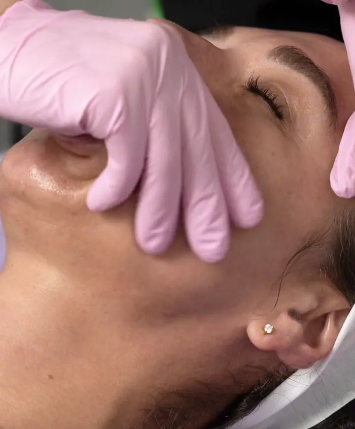 A real external Facial Sculpt massage being performed at LESIQUE SPA.